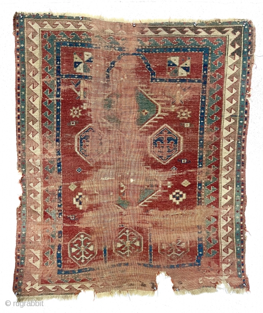 Antique Kazak prayer rug. Older rug in distressed condition with spacious drawing (what there is) and all good natural colors. Ghostly early example in time for Halloween! Priced accordingly. Mid 19th c.  ...