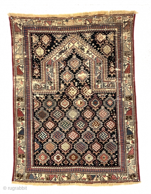 Antique Caucasian marasali prayer rug. Thin with low pile, scattered wear, and a small old crude repair or two. Not the Straka rug but very eye catching on the wall (and affordable).  ...