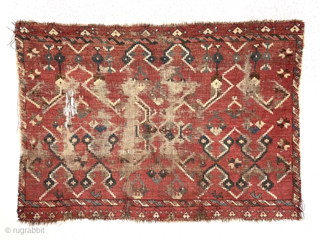 Archaic turkman chuval. Local New England find. Presumably ersari with an unusually spacious ikat inspired design. Lovely natural colors with yellow highlights. Persian knotted open to the right. Unfortunately very rough, not  ...