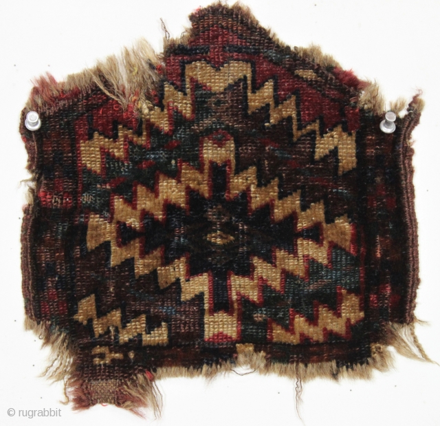 Antique tiny turkoman weaving. All good old natural colors. Not sure exactly how it was used but it's the oldest one I've seen. ca. 1875 or earlier. 9" x 10" 
  