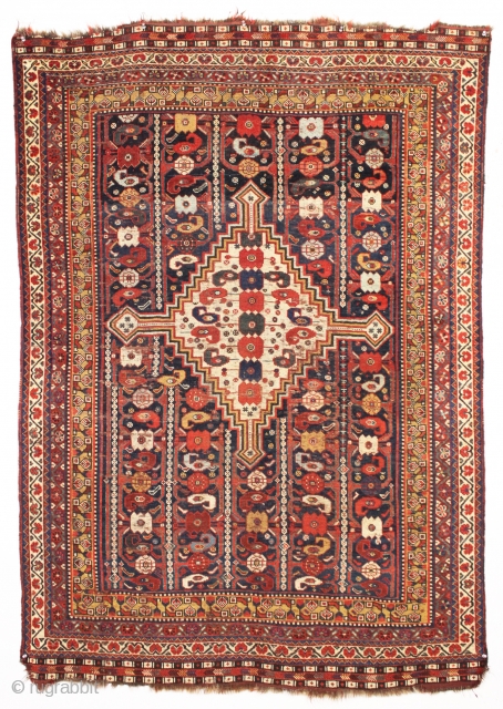 antique little south persian rug in good condition with a very interesting design. An unusual combination of allover field elements and a dramatic ivory medallion. All well saturated natural colors and good  ...