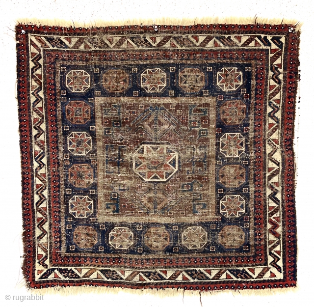 Ghostly but friendly old Baluch square middle bagface. I like the border. 19th c. 
2’7” x 2’10”                