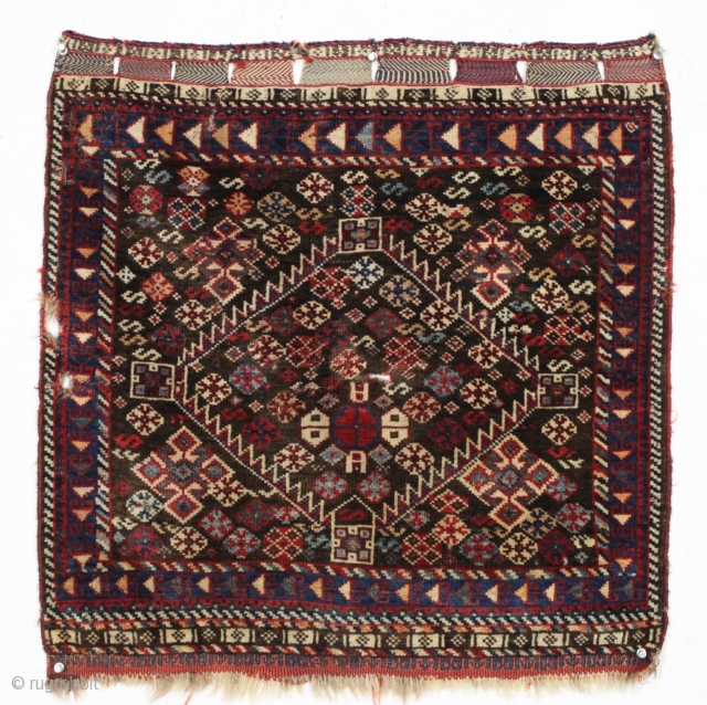 Antique south persian bagface. Unusual natural brown ground. All natural colors. Pretty good pile with a few small holes (6 holes and a gouge). Good repair project. Reasonably clean. 19th c. weaving  ...