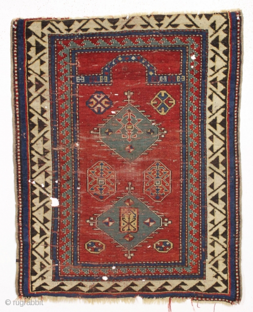 antique small kazak prayer rug. Nicely drawn version of a classic type. All natural colors. A delectable morsel and evidently the moths thought so as well. "as found", dirty with scattered nibbles,  ...