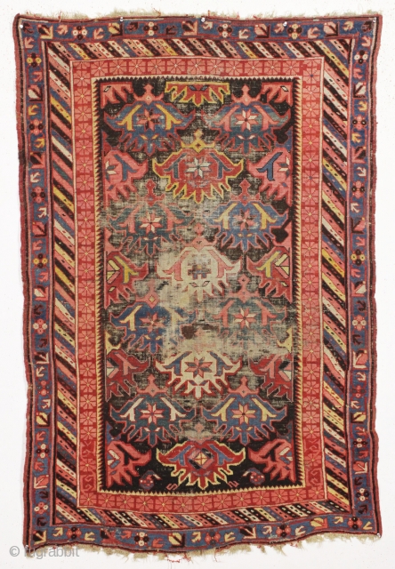 antique seichour rug. Eye catching large scale palmette design. All natural colors. "as found", dirty with wear and heavy brown oxidation as shown. Small palm sized spot of crude attempted flat stitch  ...