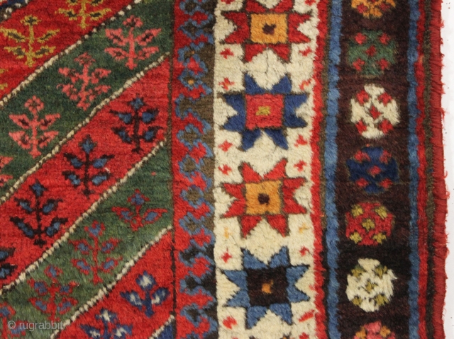 antique kurdish rug in good condition with a bold design and superb colors. Genuine old rug from a New England home. Overall fleecy wool and thick good pile with only slight wear.  ...