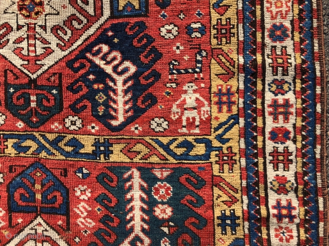 Antique Caucasian karrabagh rug, a type often described as “Kasim Ushak”. This reasonably early example has the characteristic medallions and serrated leaf motifs plus many interesting tribal decorations of humans and animals.  ...