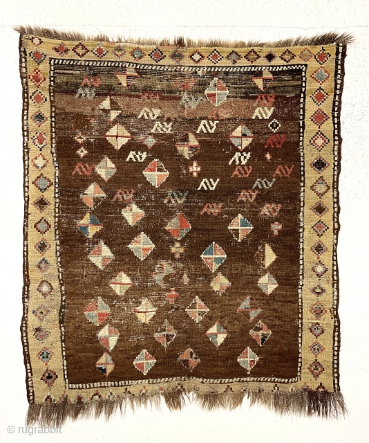 Antique Caucasian rug, possibly zakatala, with an early and non commercial look. Coarsely woven with earthy colors. A hard but appreciated life with substantial areas of flat stitching and other small crude  ...