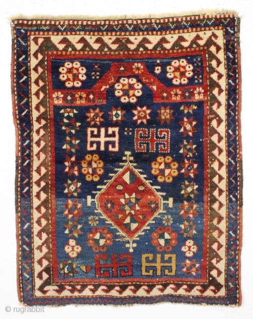 All original diminutive kazak prayer rug.                           