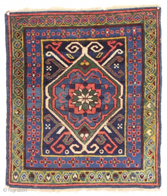 antique tiny kuba rug with an attractive green chi chi type border. Very unusual little rug caucasian rug with all natural colors. Even low pile. Clean. good age, ca. 1875. 2'1" x  ...