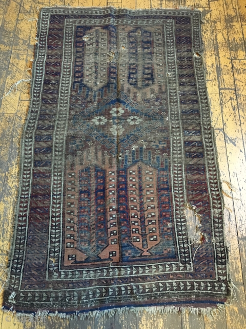 Back room storage clean out. Old Baluch rug. Dirty, worn an damaged. About 3' x 5'                 