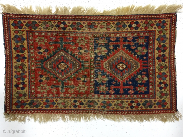 Antique large Kurdish bagface. Rough but older example of this group. Heavy brown oxidation and scattered wear as shown. All natural colors. Reasonably clean. Ca. 1875. 2' x 3'4"
    