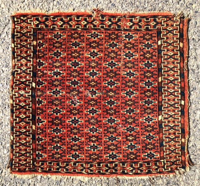 Antique little turkman pile weaving also in the square format. Interesting all over design field using well known yomud border motifs. I associate the complex vine main border with tekke weaving. Beautiful  ...