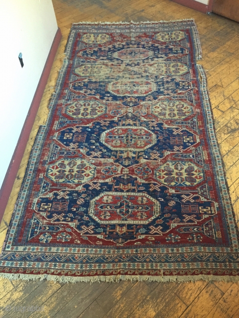 Antique Caucasian soumak rug fragment. As found, with wear, a few small edge tears, sides reduced. Clean. All natural colors. Storage clean out and priced accordingly. Good age, ca. 1875 or earlier.  ...