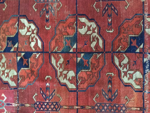 Antique Tekke main carpet fragment. As found with wear, stains, patches, reduced size. All natural colors. Storage clean out and priced accordingly. Good age, ca. 1870 or earlier. 3'8" x 6'7"  