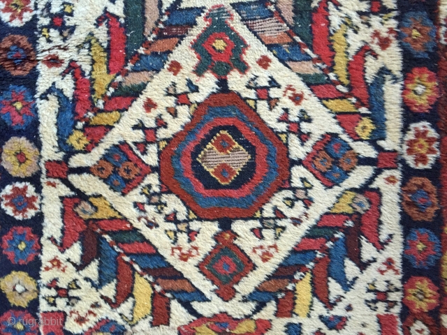 Antique northwest Persian rug. Brilliant natural colors. Mostly thick full pile with small areas of damage as shown. As found, needing a good wash. Needs repiling of old moth damage exposing foundation.  ...