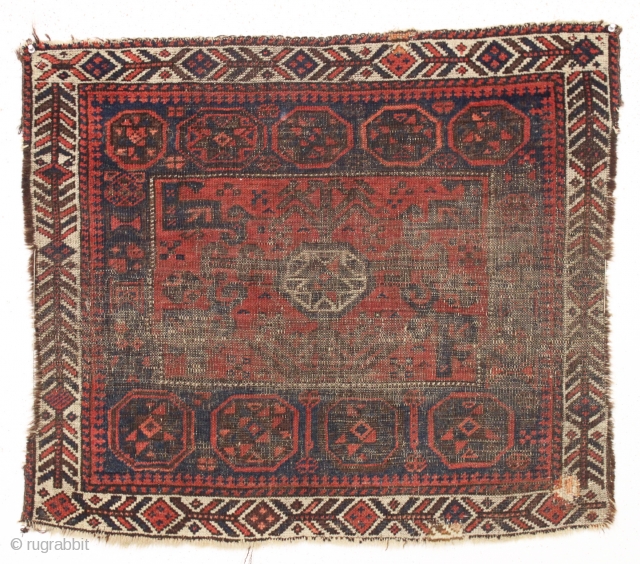 antique baluch square middle bagface. Another piece fresh from a local Boston home. Thin but genuine,  with considerable wear and priced accordingly. 19th c. 29" x 34"     