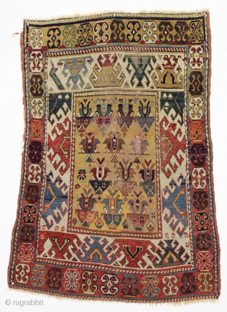 Antique caucasian mystery rug. Terrific design. All natural colors with extreme abrash. "as found", very dirty with some center wear as shown. Original selvages. I see no repairs. Elements of kazak type  ...