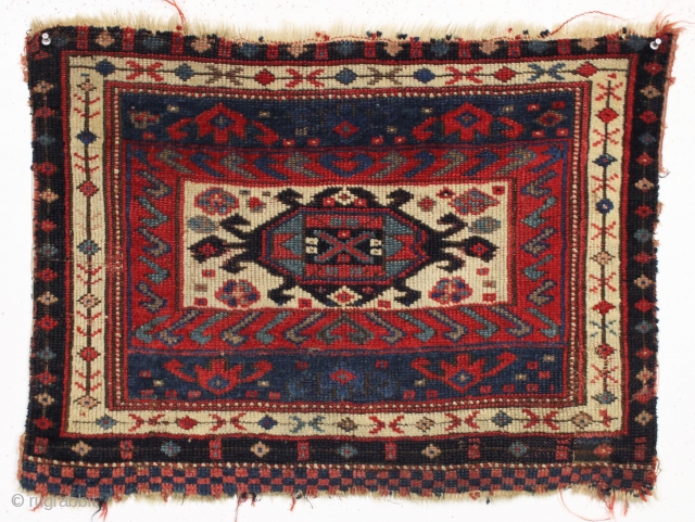 antique kurdish bagface. Good example of an interesting design. All natural colors with highest quality wool. Clean. Good age, ca. 3rd qtr. 19th c. 20" x 28"      