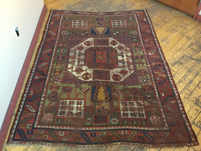 Antique karachopf kazak rug. As found, dirty with heavy wear and old poor repairs. More or less Intact old survivor. Storage clean out nearing the end. 19th c. 5'3" x 7' 1" 