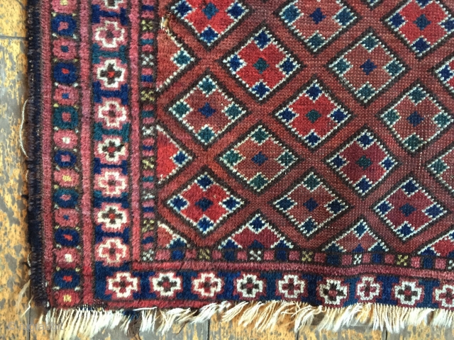 Antique little Ersari rug with an interesting diamond lattice design. Very dirty by Looks like all natural colors to me. As found, edge damage and a few little holes. Thin old glue  ...