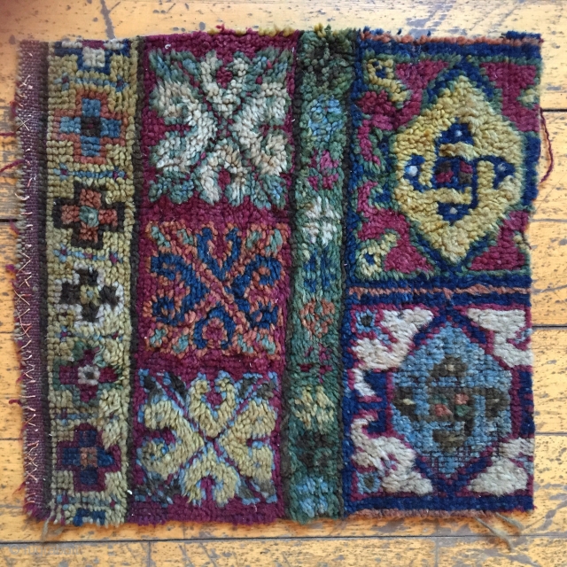 Mysterious little fragment of a rug found while cleaning out storage. Interesting color palette and whirling design elements. Dark purple wool wefts and natural brown wool warps. Good pile but very dirty.  ...