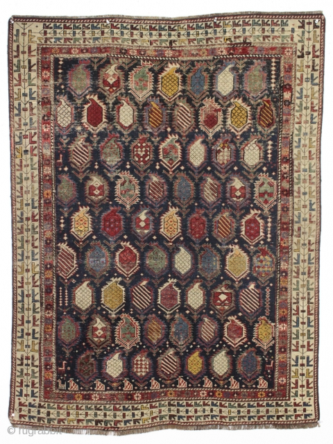 Antique early east caucasian rug. Interesting marasali type radiating boteh in a non prayer rug format. The large variety of boteh I see as a sign of good age and the unusual  ...