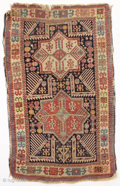 antique caucasian akstafa rug with a most unusual format. Two large conjoined birds form an elegant prayer arch. I do not recall seeing this before. As found, very very dirty with mostly  ...