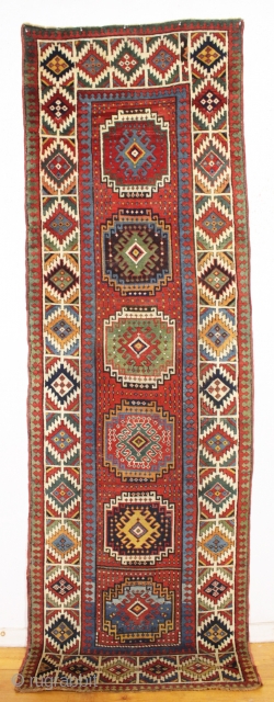 antique moghan long rug with absolutely beautiful natural colors and overall good condition for a genuine old rug. Bold and eye catching design. Lovely greens, aubergine, golds and a pretty yellow. Washed  ...