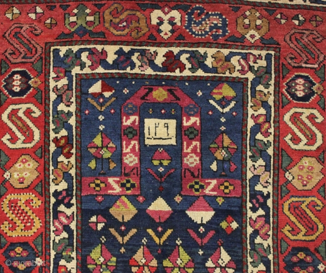 Antique dated small caucasian prayer rug featuring a terrific main border. Good condition with full thick pile. Wide range of good natural colors including at least two shades of insect cochineal along  ...