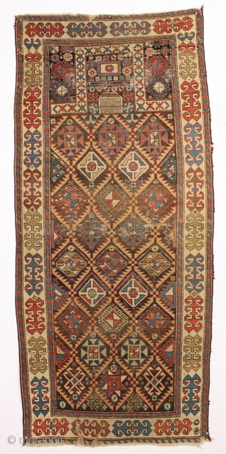 antique caucasian akstafa prayer rug. Classic long narrow format with aquared mihrab. "as found", unrestored and very dirty with scattered wear and a bit of edge damage. All natural colors. Good restoration  ...