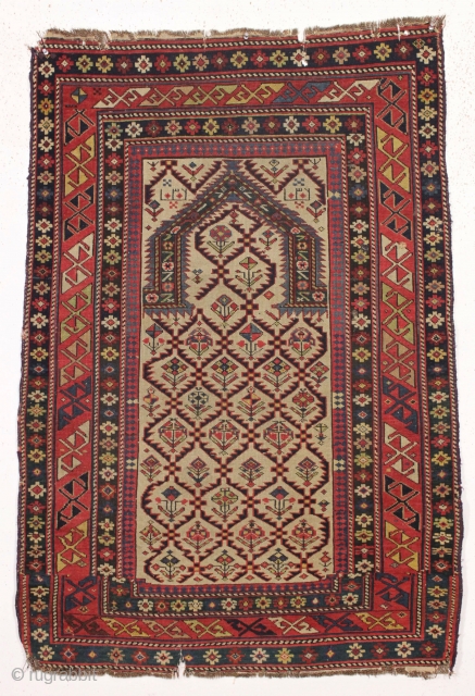 antique ivory ground shirvan prayer rug with a quirky design shift near the lower end. Older example, as found, very dirty and not yet restored. Overall good even pile and excellent natural  ...