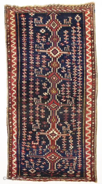 Antique Persian tribal rug, probably Luri, with an unusual flat weave inspired design. Beautiful all natural colors. Overall good condition with even pile. Interesting deep indigo ground with lines of natural brown  ...