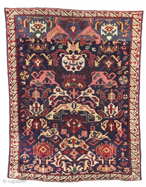 antique little bijov kuba rug in good condition. Characteristic bijov field motifs together with charming humans and animals. All natural colors. Overall even pile. Clean. No holes, tears and good original selvages.  ...