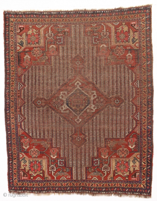 antique south persian qashqai rug with good design and older colors. "as found". very very dirty with heavy center wear as shown and priced accordingly. natural colors. all wool. late 19th c.  ...