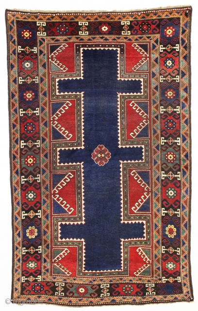antique large Caucasian rug with a powerful design.  Appears caucasian although certainly not karachopf type as the structure with brown wefting and goat hair selvages are not typical kazak. Neither is  ...