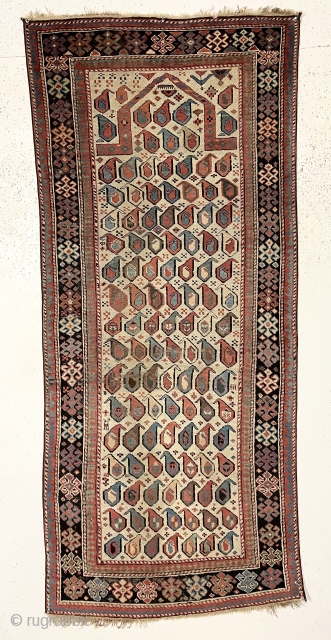 Antique Caucasian akstafa prayer rug from a New England home. Beautiful ivory ground example with all natural colors and good pile. Lovely purples, greens, light blues and of course the pretty akstafa  ...