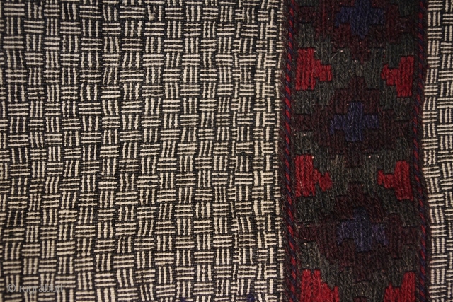 C141. Long sofre. Collected Afghanistan, but unknown origin. The field weave is unique - we've never seen it before. The border could be north or south Afghanistan. Mostly warp wrap kilim, but  ...
