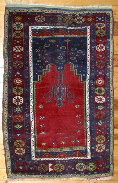 Central Anatolian Prayer Rug with a design that shows Ladik influences,but is certainly an anonymus village weaving. 165x114 cm.W/W. Around 1900.
Very good condition with only small, restricted spots of foundation.Full pile all  ...