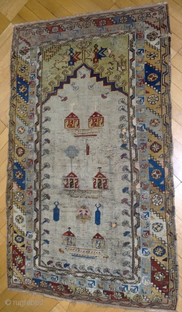 Important 18th C White field Konya, Ladik rug 180/100 cm. The upper part ( 15 cm ) and the lower part (5 cm) have been rewoven long ago. A few small repairs  ...