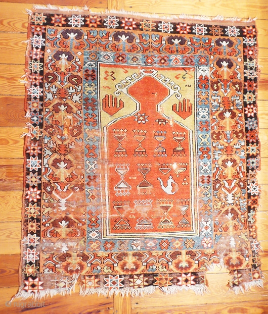 I do hate the description 'museum piece' but in this case you are looking at one. Konya before 1800. Fairly large sized for an anatolian prayer rug, 130x120cm. If seriously interested please  ...