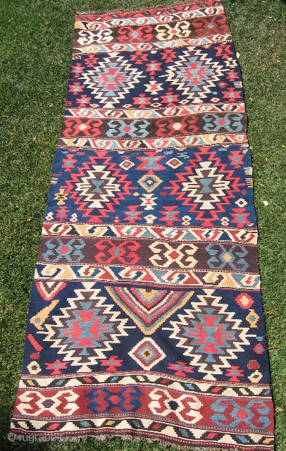   #T1000 Caucasian (Shirvan?) kilim, 4'10" x 12'10"; impressive single- piece flatweave with large-scale graphics rendered in bold colors; unusual in that instead of the normally repeating rows of similar design  ...