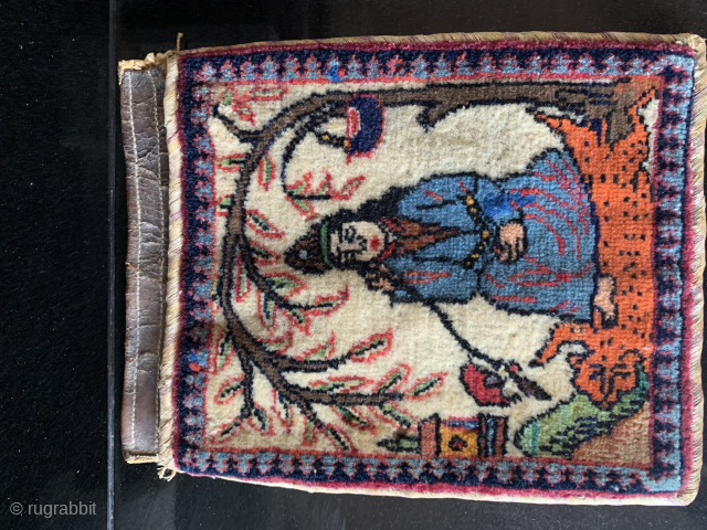 I believe an interesting Persian bag or pouch 7" x 9". The individual is a Sufi or Dervish. He is identified by his hat and begging bowl and sitting on a leopard  ...