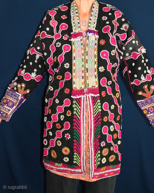 A rare find - Wedding coat from the Mangal - Pashtun tribal people of Khost province , Afghanistan

Wonderfully embroidered with a central protective amulet in gold thread on the back.


Early 20th Century  ...