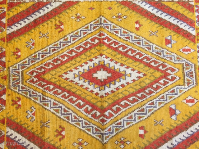 A superb Moroccan High Atlas Ait Ouaouzguite rug with a magnificent design concept size 5 x 8.                