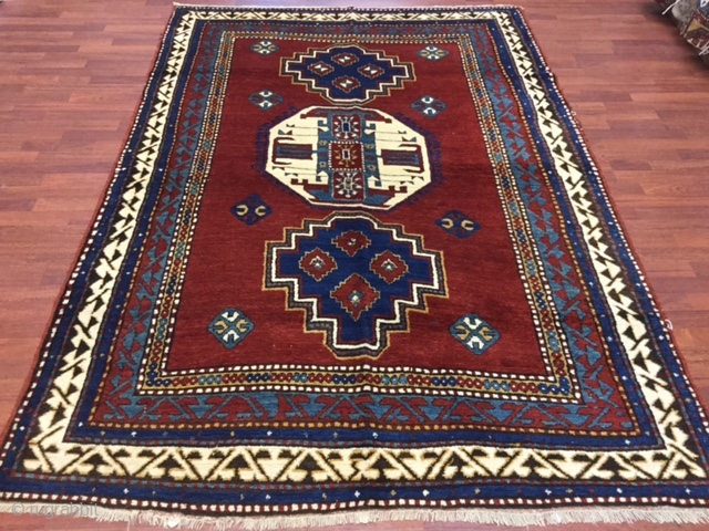 Antique Lori-Pampak Caucasian Rug-3038.  Southwest Caucasian,size 5 ft. 7 inches by 8 ft. 2 inches, circa 1920, two blue and one octagon medallion covered the entire deep-red field, The Greek key  ...