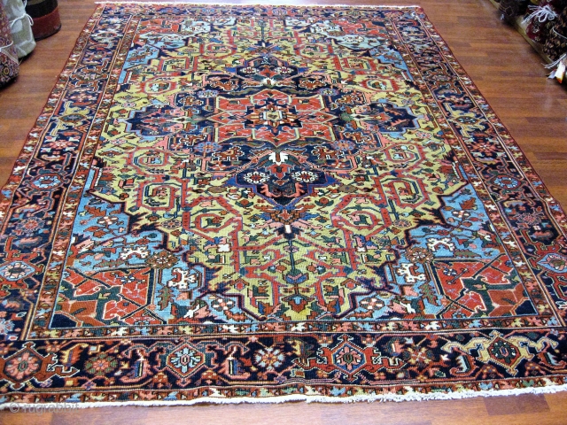 Antique Heriz Rug-4016-Antique Persian Heriz, from northwest Persia, size 7 ft. 4 inches by 9 ft. 10 inches, circa 1920. Large diamond medallion surrounded by palmette and flowering vines in green,light blue,  ...