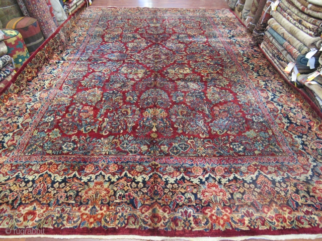 Mint large size antique Persian Sarouk Rug-2290. Central Persia, size 10 ft. 10 inches by 15 ft. 8 inches, circa 1920. large floral design in blue,rose,green,tan and red on deep red field,floral  ...
