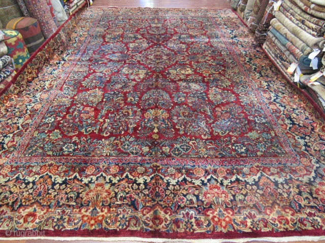 Mint large size antique Persian Sarouk Rug-2290. Central Persia, size 10 ft. 10 inches by 15 ft. 8 inches, circa 1920. large floral design in blue,rose,green,tan and red on deep red field,floral  ...