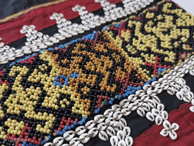 Spectacular Beaded Wedding Skirt Kain Lekok - early 1900s, Borneo. See more here: https://wovensouls.com/products/1440-museum-quality-antique-iban-wedding-skirt-jacket-beaded-band-kain-lekok?ls=en                   